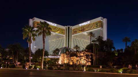 The Mirage hotel and casino on the Las Vegas Strip, lit up at night.