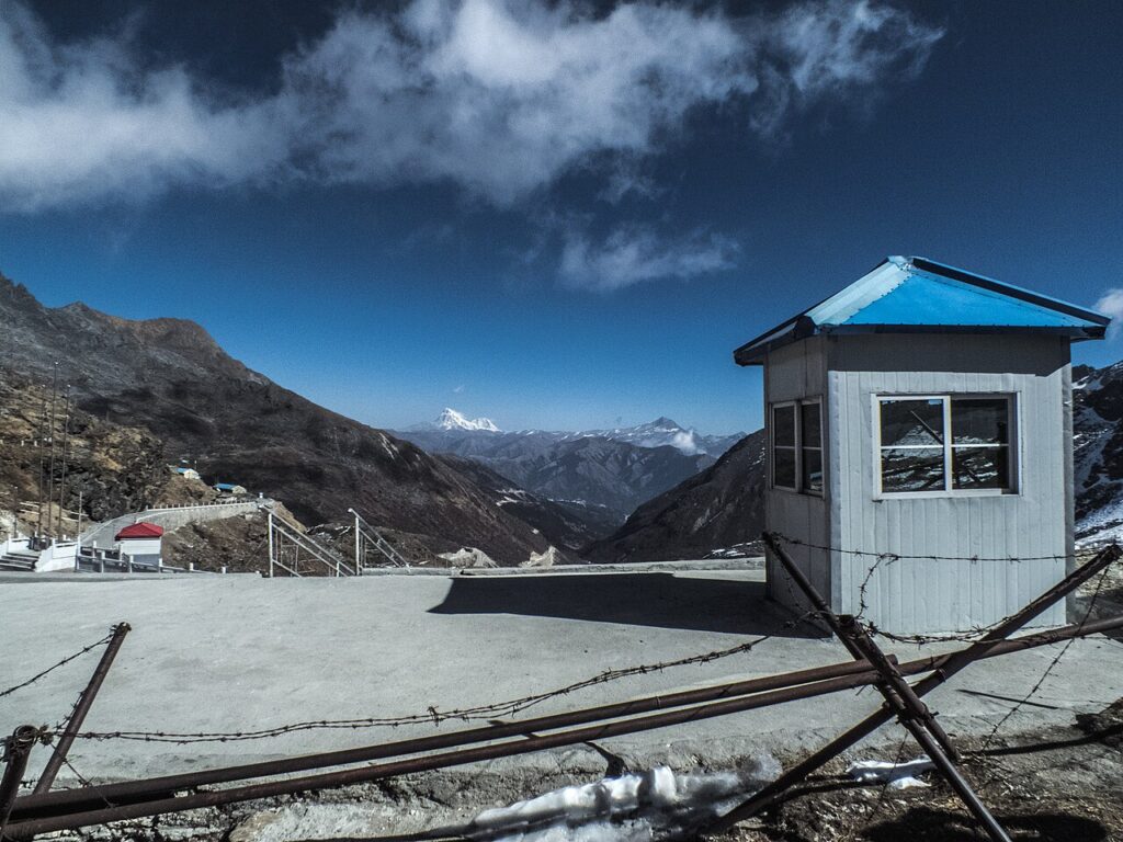 The border fence and a Chinese check post seen from the Indian side at Nathu La pass in Sikkim.