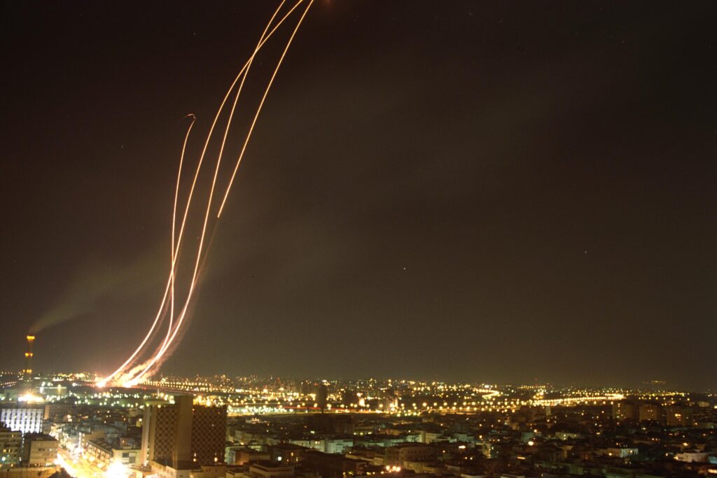 Patriot air-defence missiles launching at night