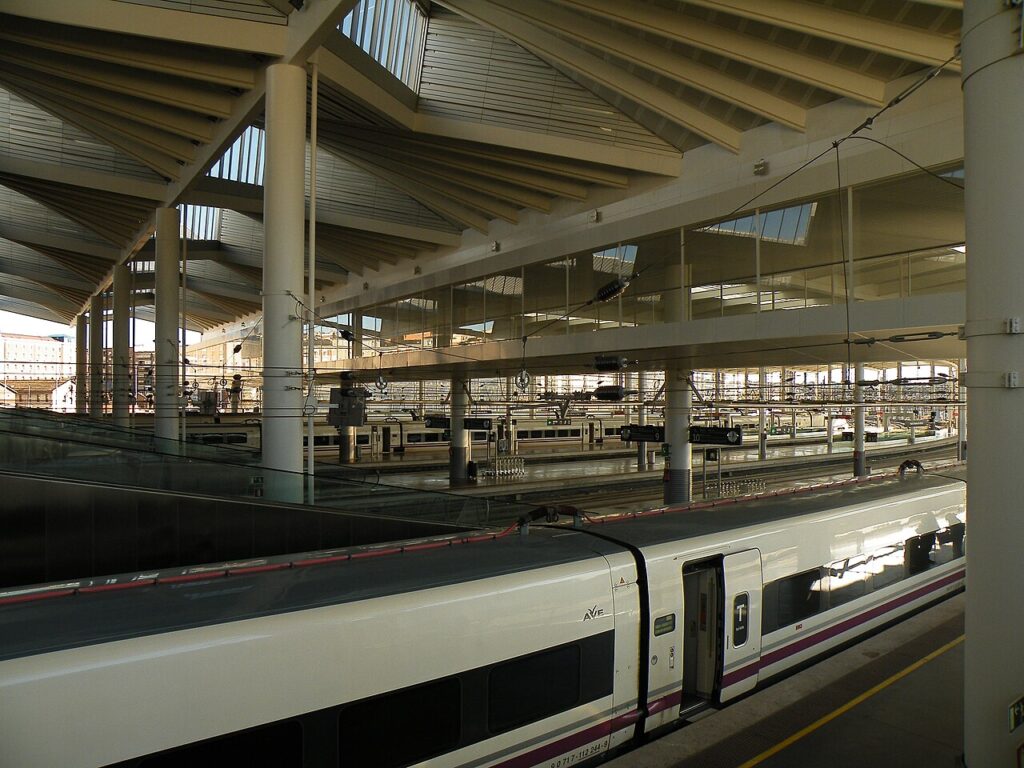 High-speed AVE trains at platforms in Madrid's Atocha station.