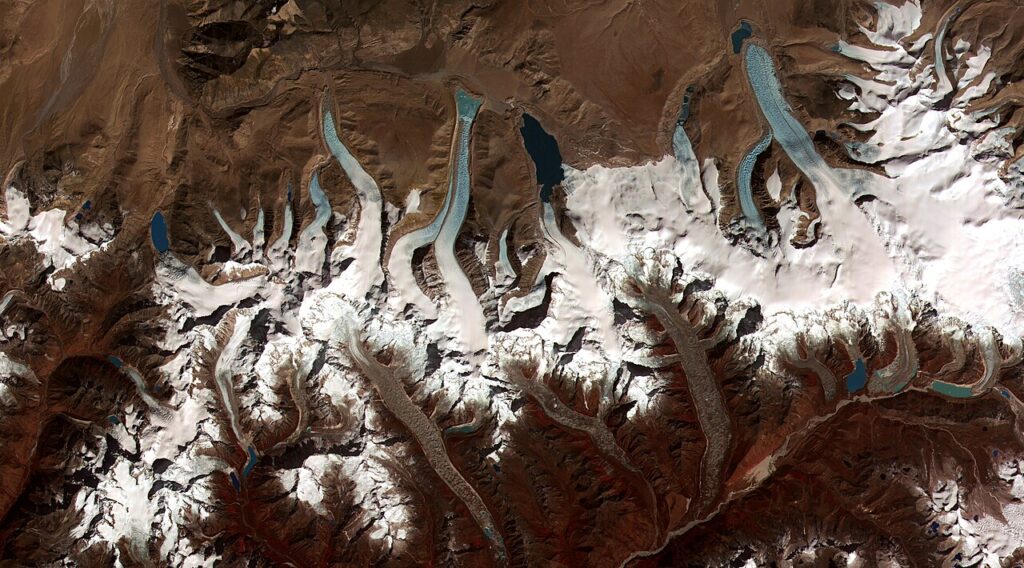 Glacial lakes nestled among snow-covered peaks in the Bhutan Himalaya.
