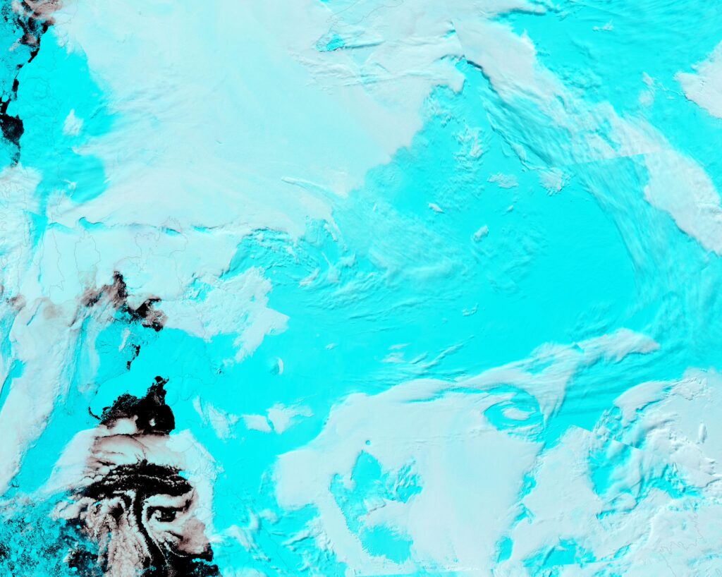 Satellite view of Antarctica's Thwaites Glacier, with ice-flow lines streaming toward the Amundsen Sea