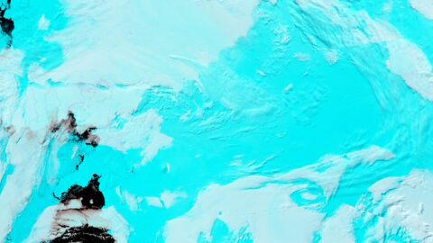Satellite view of Antarctica's Thwaites Glacier, with ice-flow lines streaming toward the Amundsen Sea