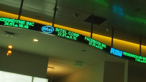 A stock ticker board displaying share prices in San Francisco