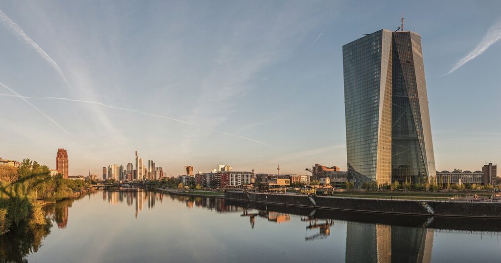The European Central Bank's twin towers in Frankfurt at dawn, against the city skyline