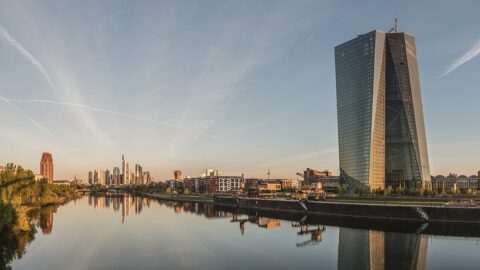 The European Central Bank's twin towers in Frankfurt at dawn, against the city skyline