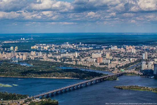 Aerial view of Kyiv, Ukraine, with bridges crossing the Dnipro River