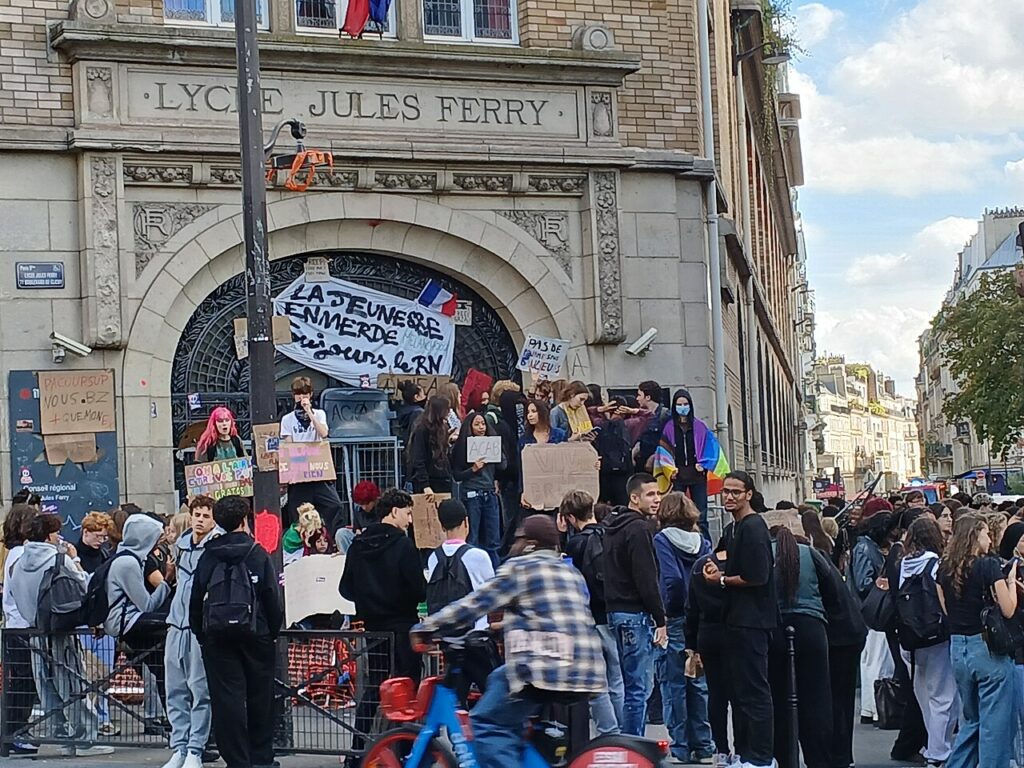 Students demonstrate outside Lycée Jules Ferry in Paris during the October 1, 2026 school protest