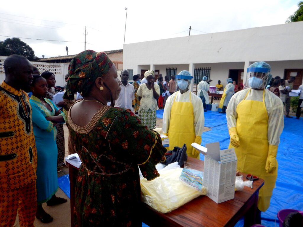 Healthcare workers model full personal protective equipment during Ebola response training — file photo.