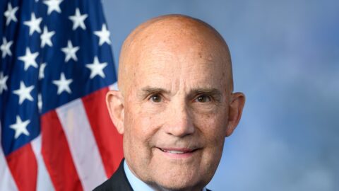 Official portrait of U.S. Representative Keith Self, 118th Congress, with an American flag