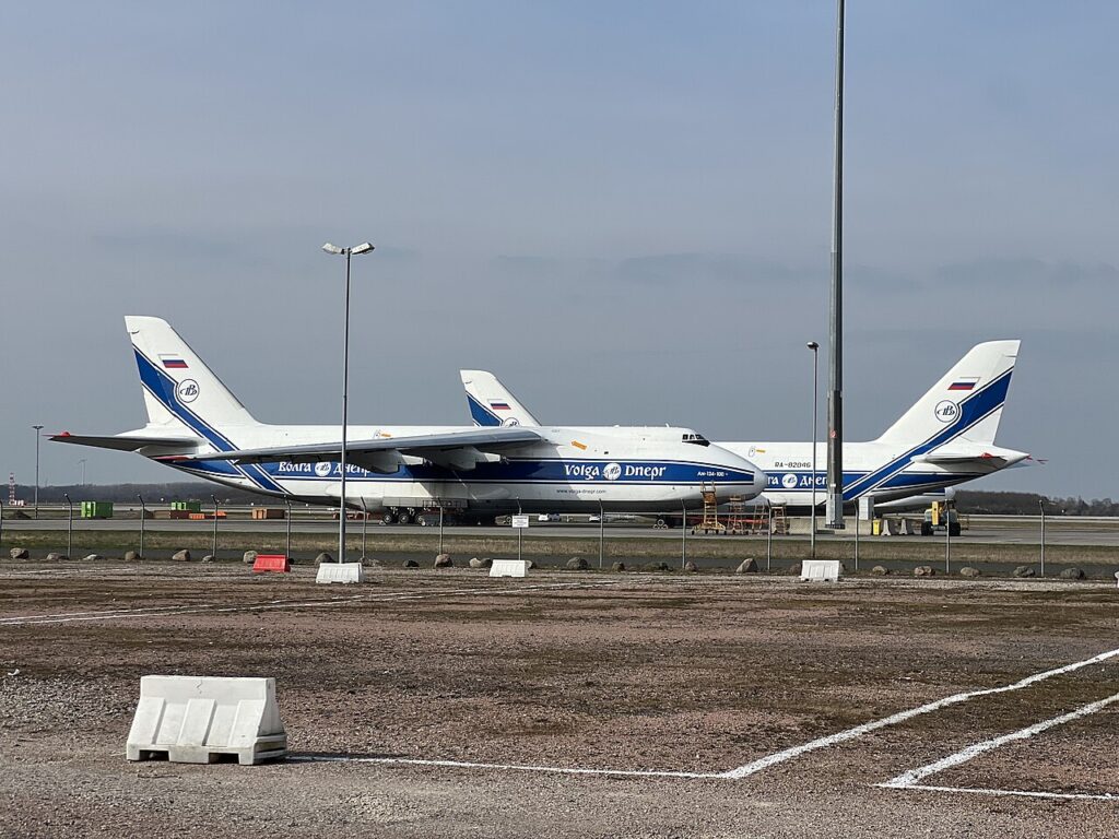 Three grounded Russian Volga-Dnepr Antonov An-124 cargo planes parked at Leipzig/Halle Airport in eastern Germany
