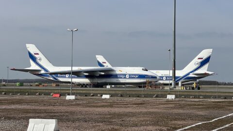 Three grounded Russian Volga-Dnepr Antonov An-124 cargo planes parked at Leipzig/Halle Airport in eastern Germany