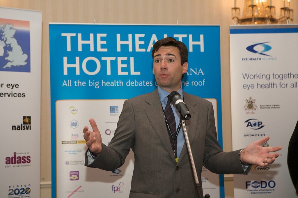 UK Prime Minister Andy Burnham speaking at an event