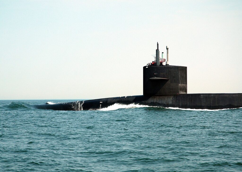 A guided-missile submarine surfaced at sea during trials