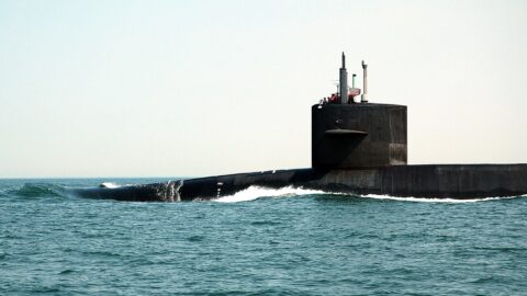 A guided-missile submarine surfaced at sea during trials