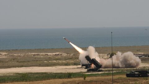 A Patriot missile system fires during a live-fire exercise.