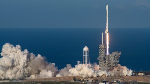 A SpaceX Falcon 9 rocket launching from Kennedy Space Center's Pad 39A