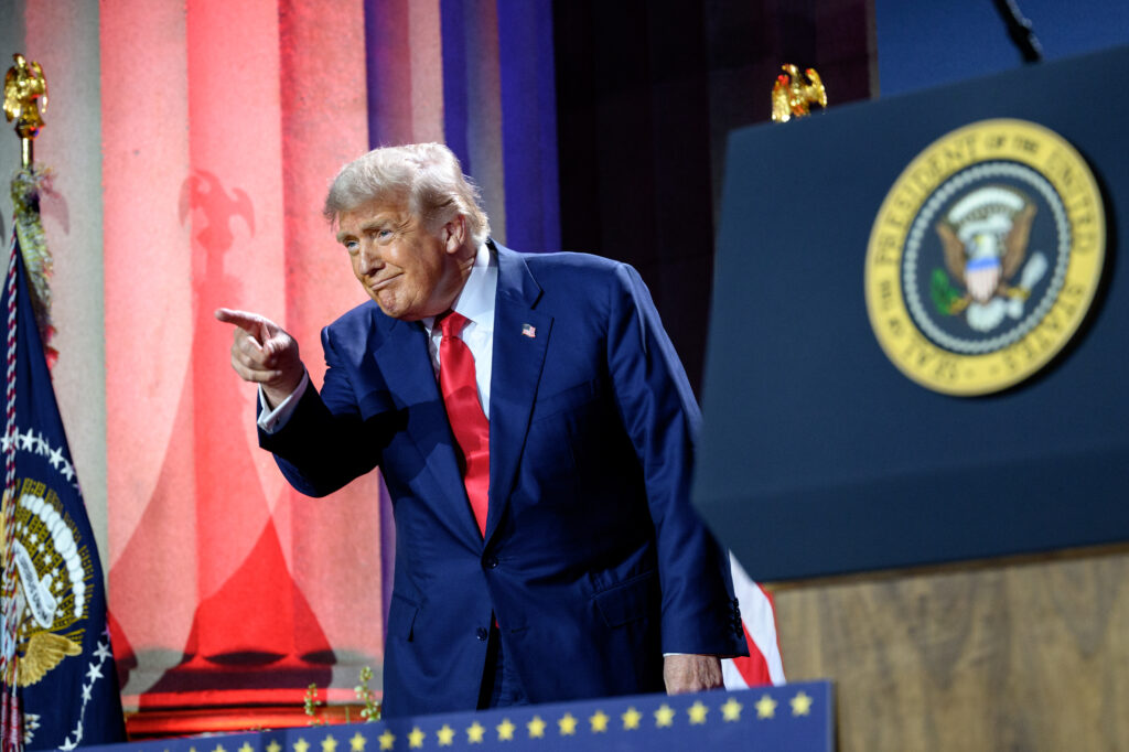 US President Donald Trump speaking at a podium