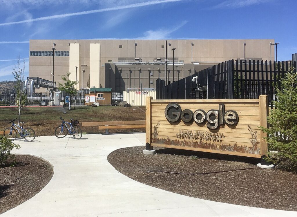 Exterior of a Google data center building, the kind of facility where frontier AI models are trained and run